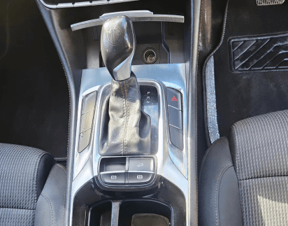 Polished gear shifter and centre console with every crevice cleaned out