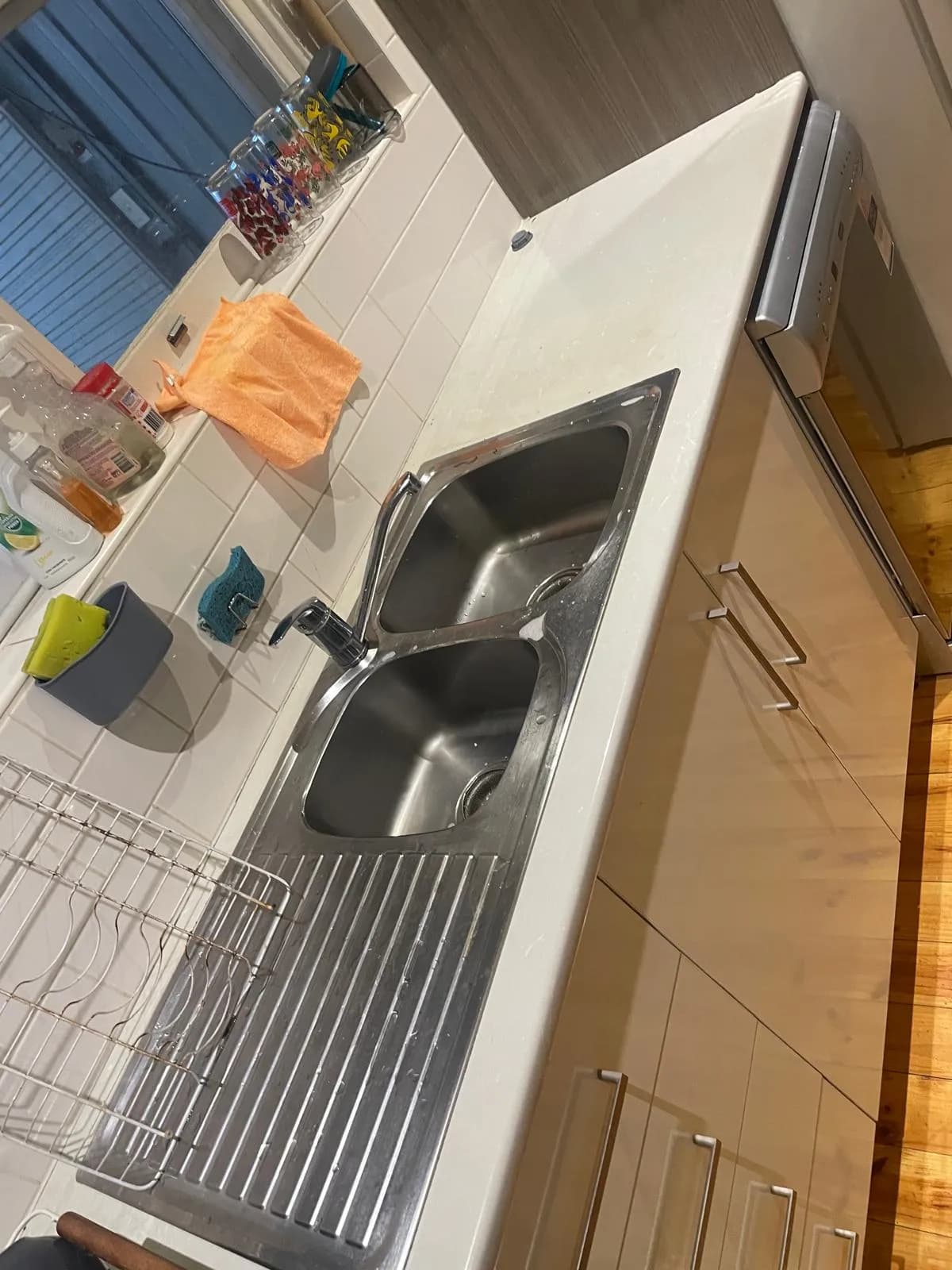 Spotless kitchen benchtop and cooktop after a deep clean