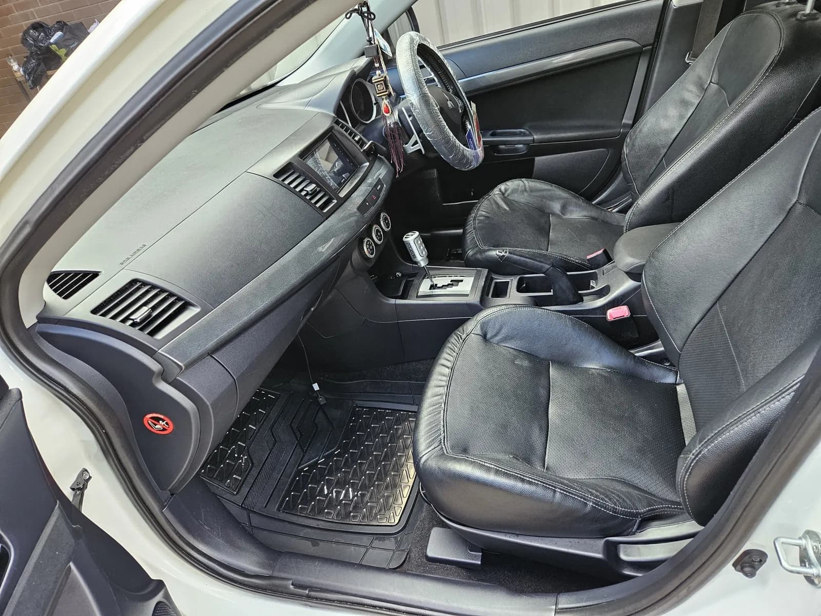 Shampooed rear seats and floor mats after a full interior detail