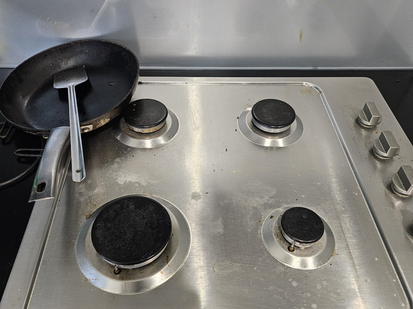 Greasy cooktop before cleaning