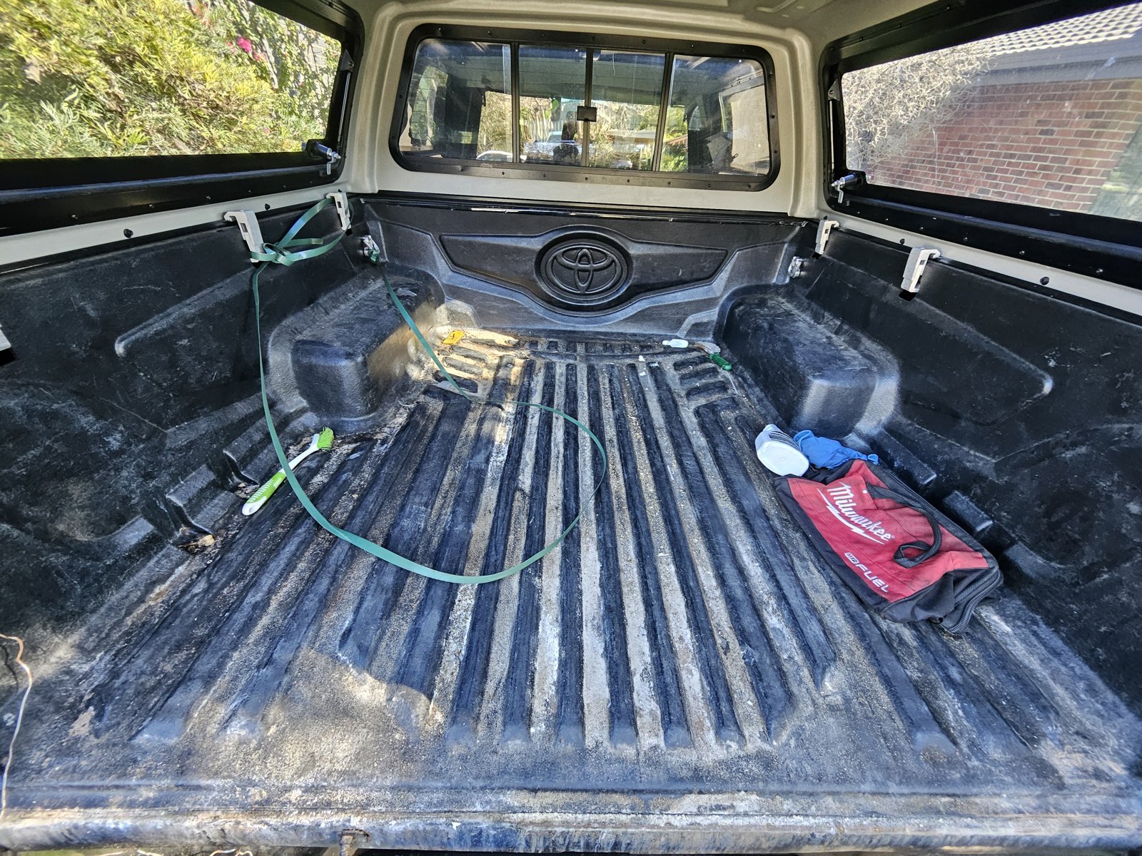 Muddy ute tray before cleaning