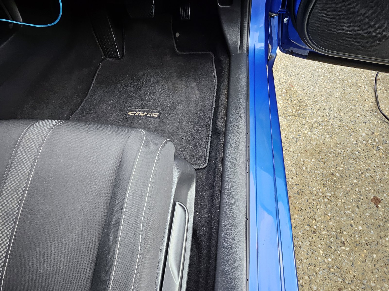 Car floor mats after vacuum and shampoo