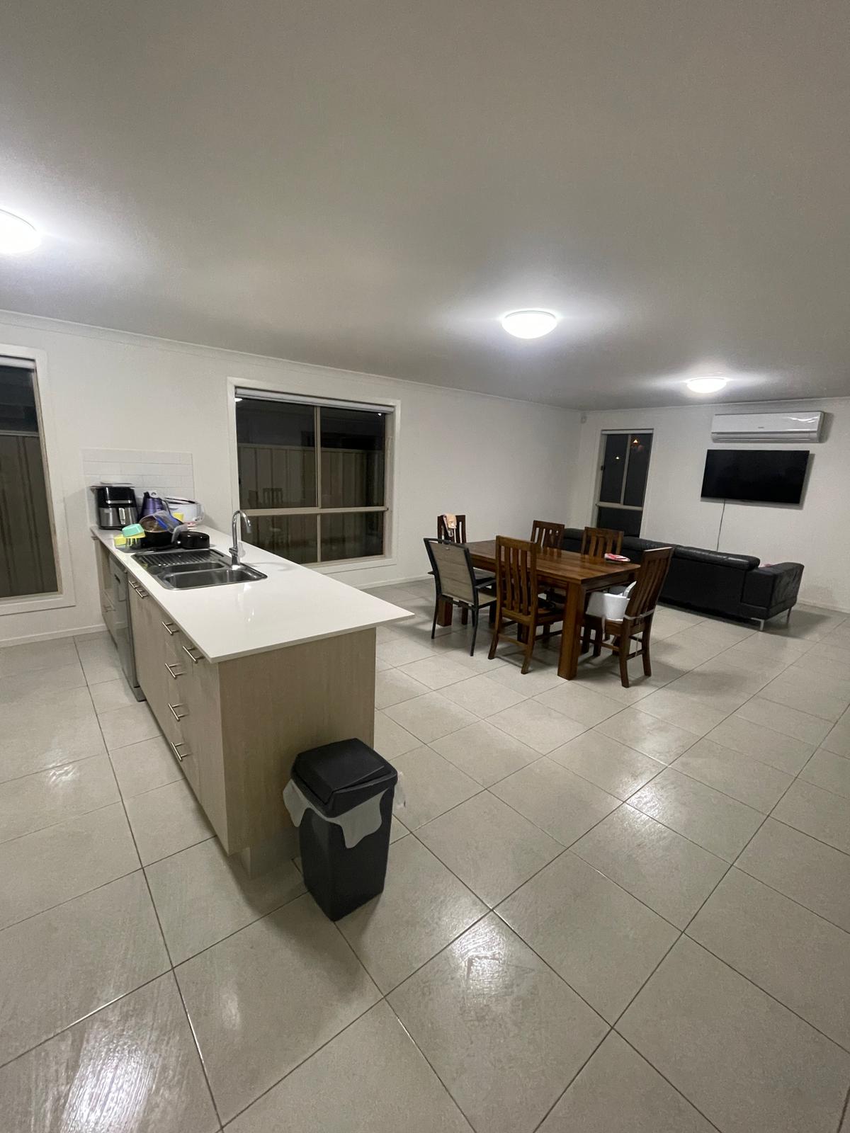 Open-plan kitchen and dining area cleaned