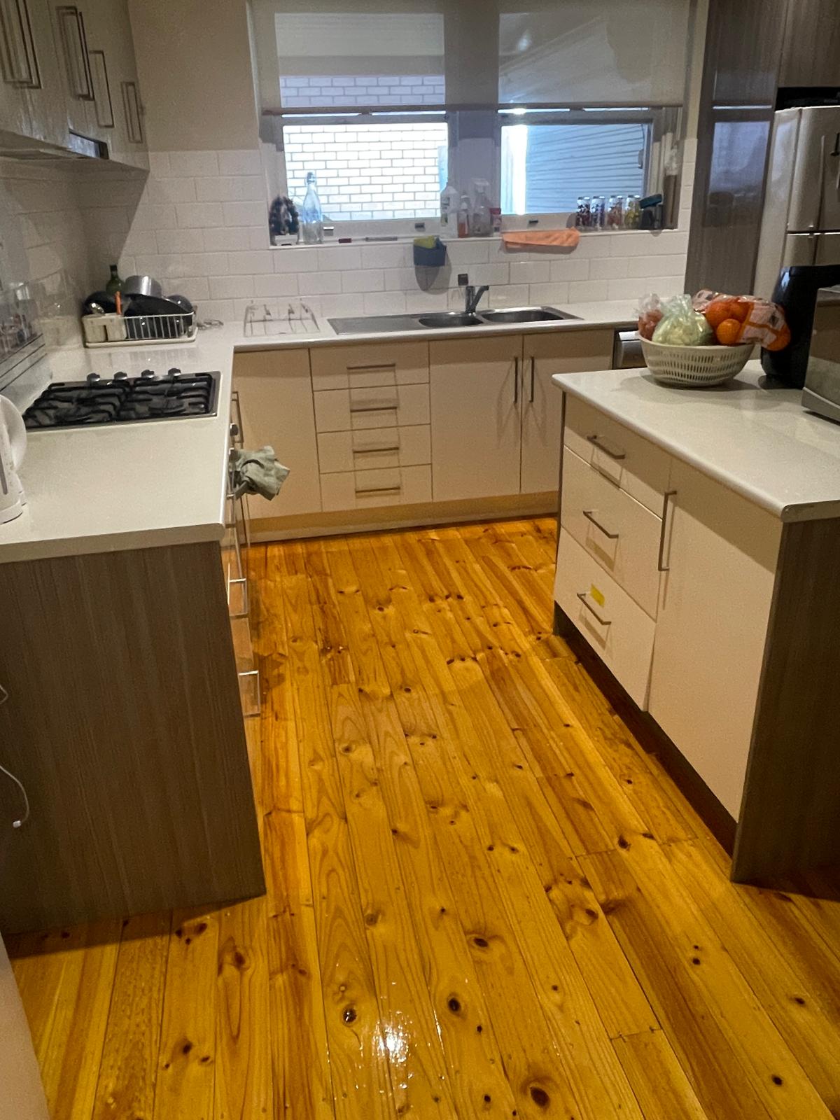 Full kitchen benchtop and floor cleaned