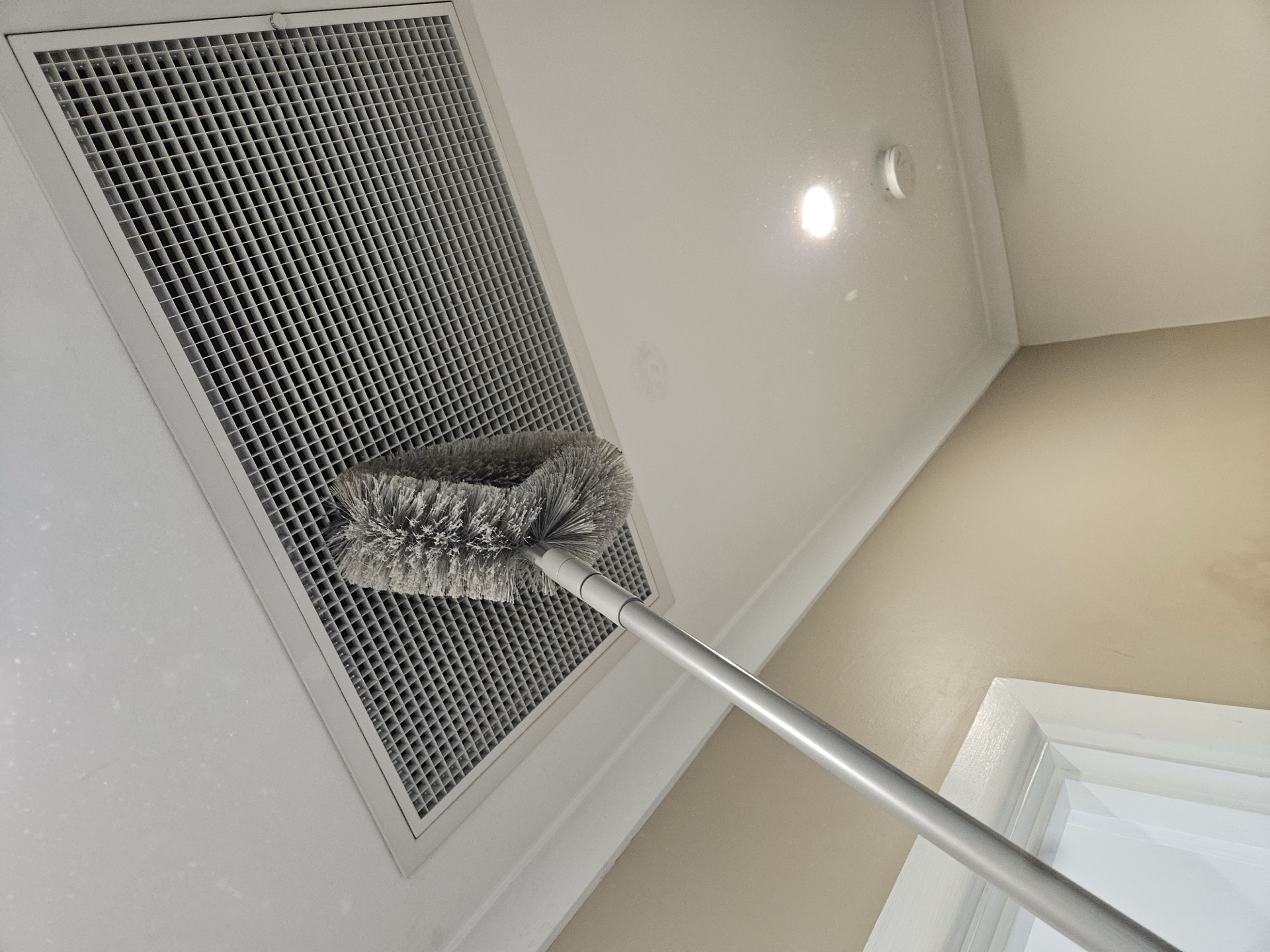 Ceiling exhaust vent dusted and cleaned