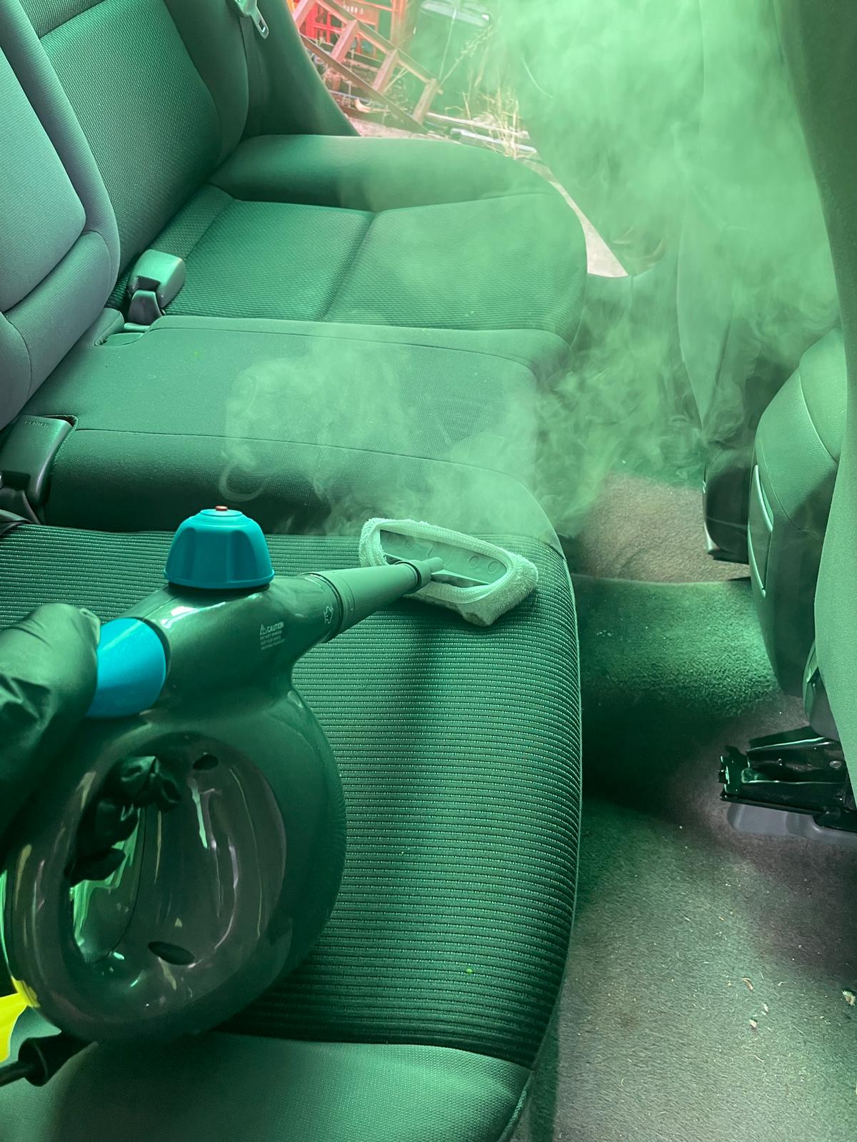 Steam cleaning car interior