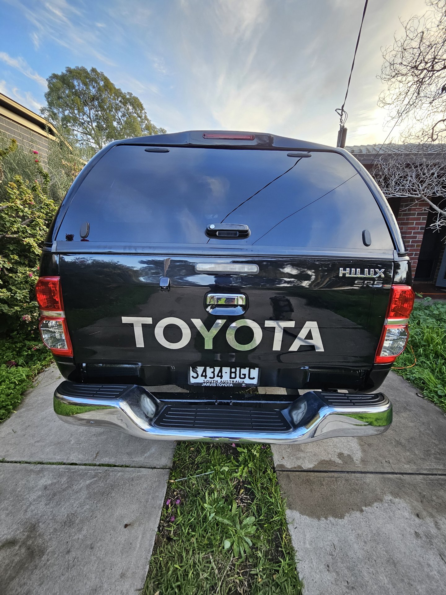 Black 4x4 ute after exterior detail