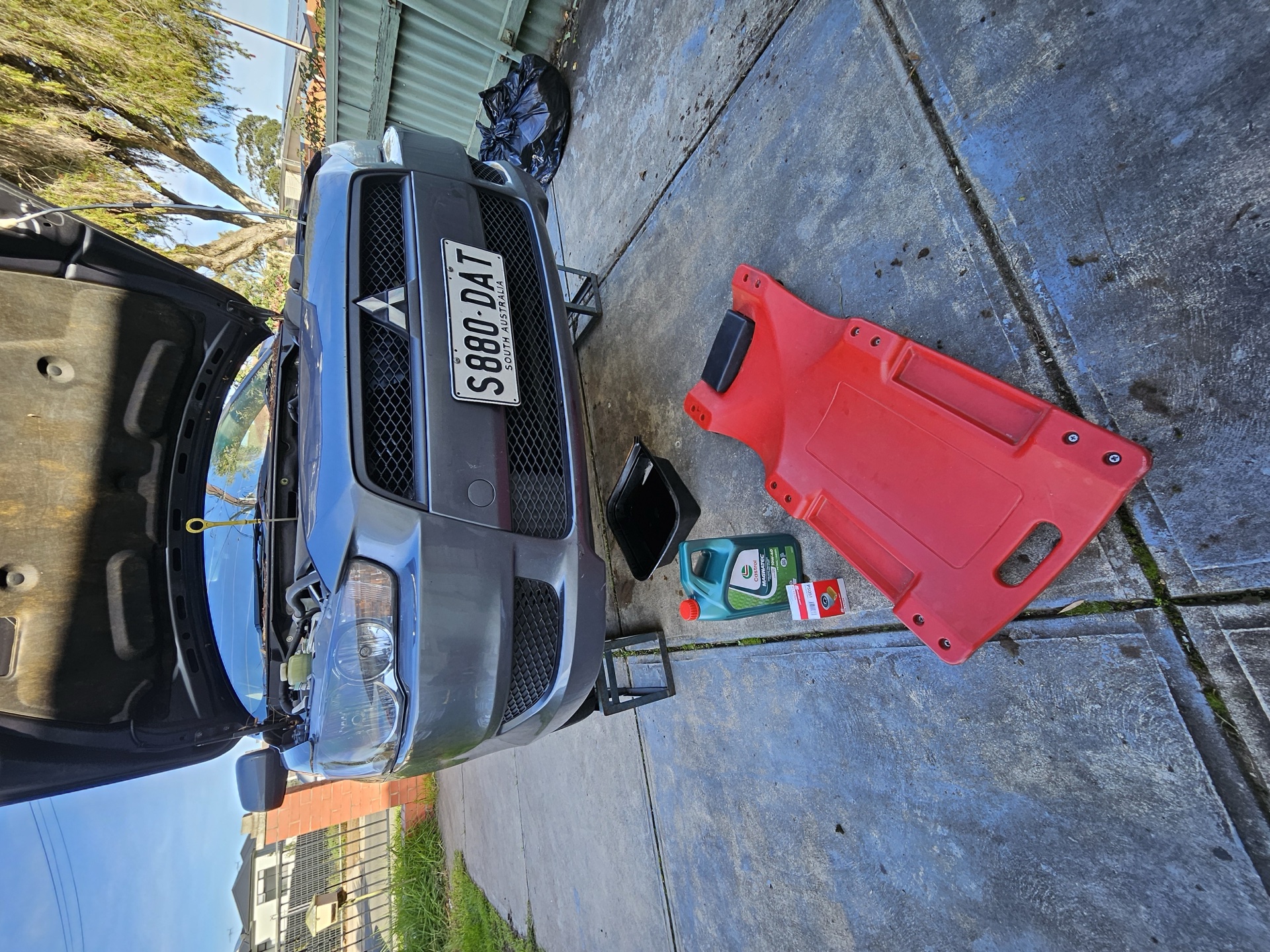 Mobile car service set up on ramps